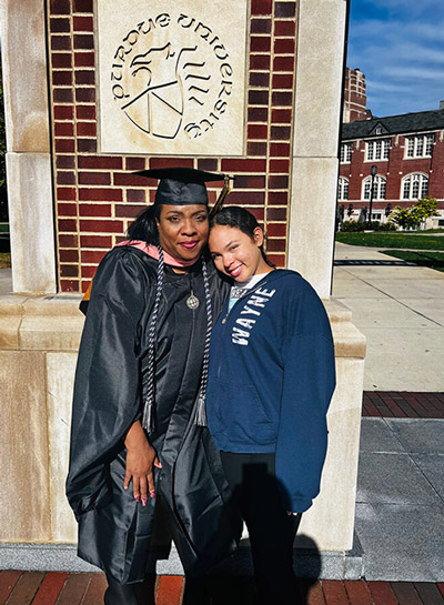Durnell and her daughter at Purdue Global graduation