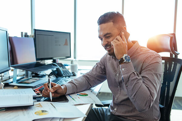 A CPA sits at a desk