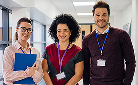 students talking in a hallway